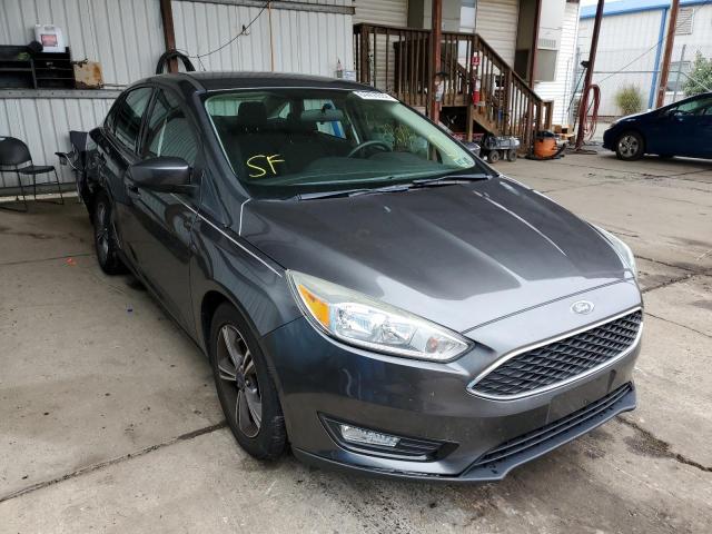 FORD FOCUS SE 2018 with VIN 1FADP3FE7JL256756 - Photo from auction