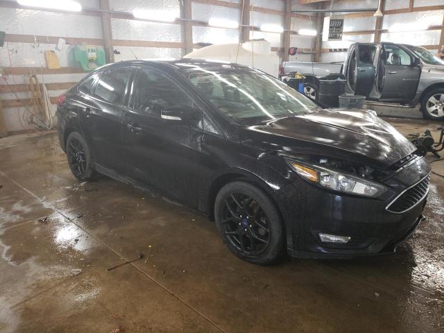 FORD FOCUS SE 2016 with VIN 1FADP3F25GL368535 - Photo from auction