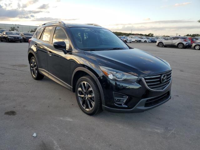 MAZDA CX-5 GT 2016 with VIN JM3KE4DY1G0788242 - Photo from auction