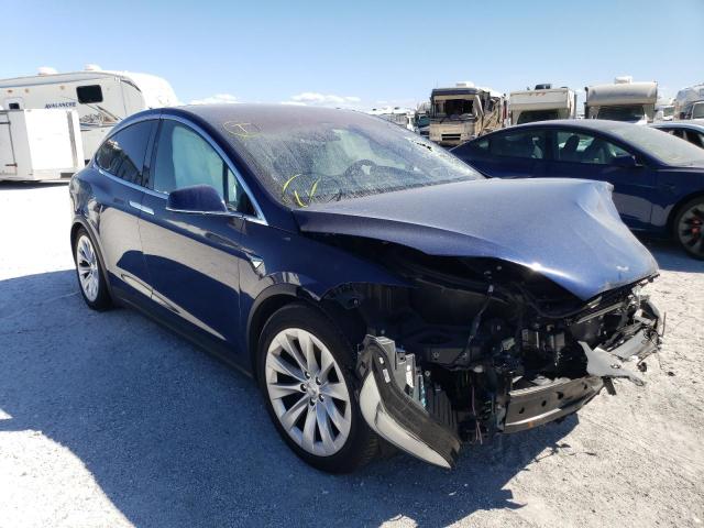 TESLA MODEL X 2016 with VIN 5YJXCBE22GF027658 - Photo from auction