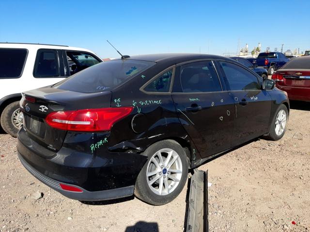 Photo 4 from auction – 2016 FORD FOCUS SE with VIN 1FADP3F29GL221442