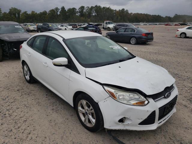 FORD FOCUS SE 2014 with VIN 1FADP3F21EL361269 - Photo from auction