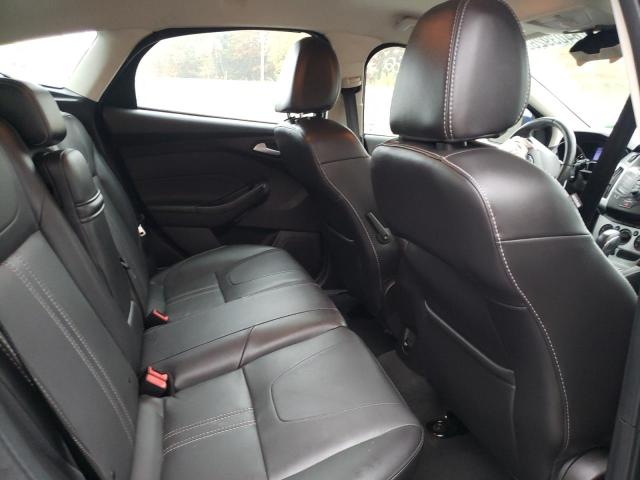 Foto 6 de la subasta – 2013 FORD FOCUS SE con VIN 1FADP3K23DL229859