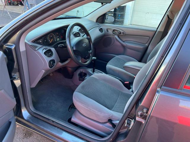 Photo 5 from auction – 2003 FORD FOCUS SE with VIN 1FAFP36383W332154