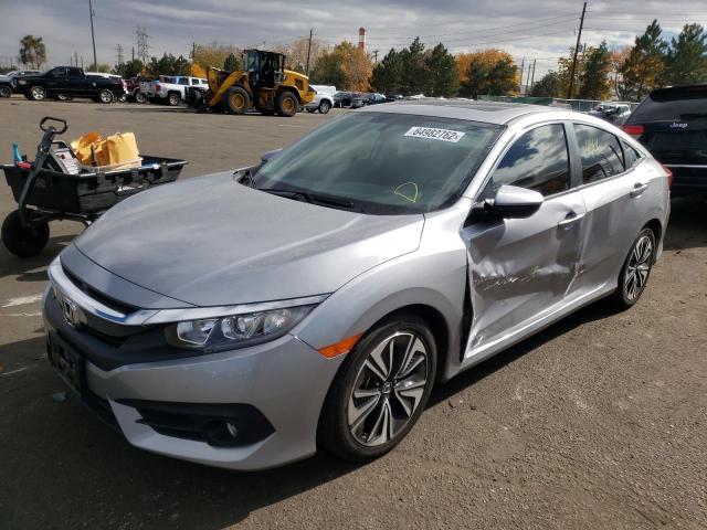 Photo 2 from auction – 2018 HONDA CIVIC EX with VIN JHMFC1F38JX002725