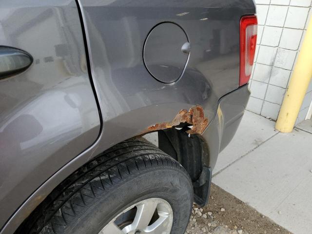 Photo 9 from auction – 2011 FORD ESCAPE LIM with VIN 1FMCU9EG1BKC29981