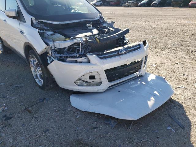 Photo 9 from auction – 2014 FORD ESCAPE TIT with VIN 1FMCU0J9XEUC92136