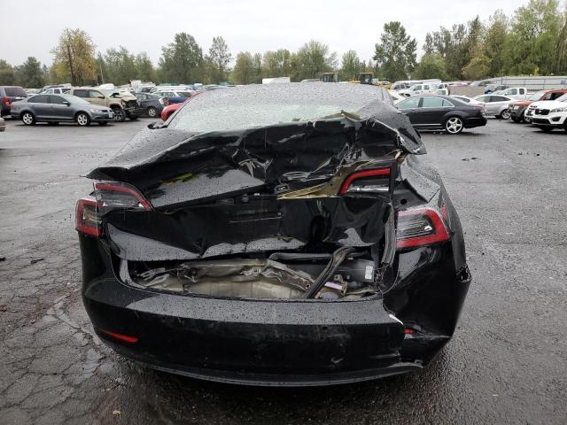 Photo 9 from auction – 2022 TESLA MODEL 3 with VIN 5YJ3E1EAXNF185205