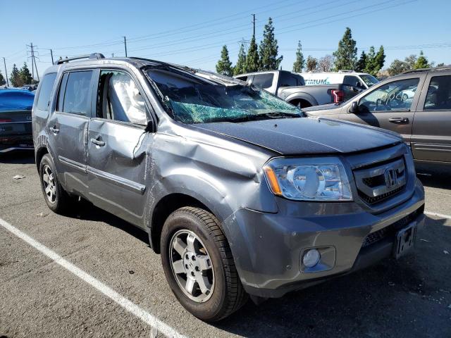 HONDA PILOT TOUR 2011 with VIN 5FNYF3H95BB031657 - Photo from auction