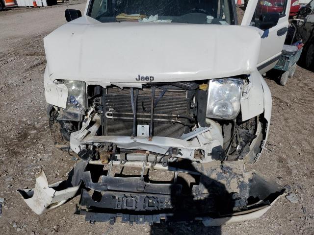 Photo 7 from auction – 2006 JEEP COMMANDER with VIN 1J8HG48N96C322934