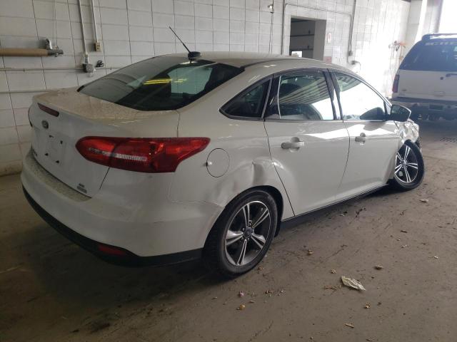 Photo 4 from auction – 2018 FORD FOCUS SE with VIN 1FADP3FE1JL204992