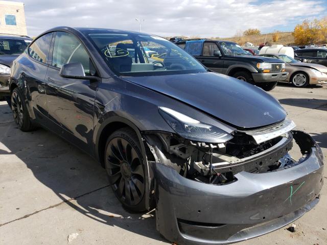 TESLA MODEL Y 2022 with VIN 7SAYGDEF8NF514693 - Photo from auction