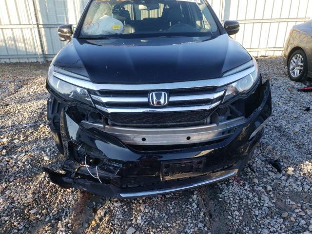 Photo 9 from auction – 2017 HONDA PILOT TOUR with VIN 5FNYF5H90HB024555