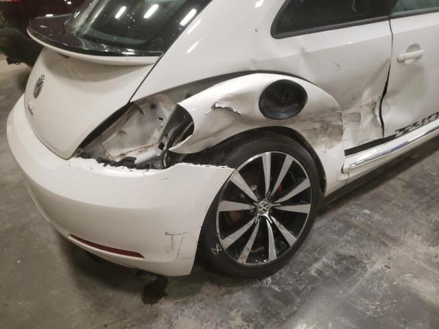 Photo 9 from auction – 2012 VOLKSWAGEN BEETLE TUR with VIN 3VWVA7AT5CM603920