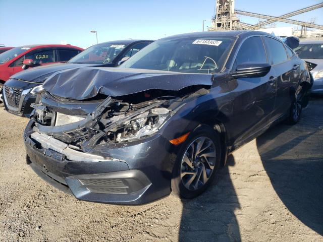 Photo 2 from auction – 2018 HONDA CIVIC EX with VIN 2HGFC2F76JH569838