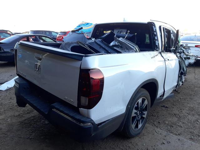 Photo 4 from auction – 2020 HONDA RIDGELINE with VIN 5FPYK3F54LB015227