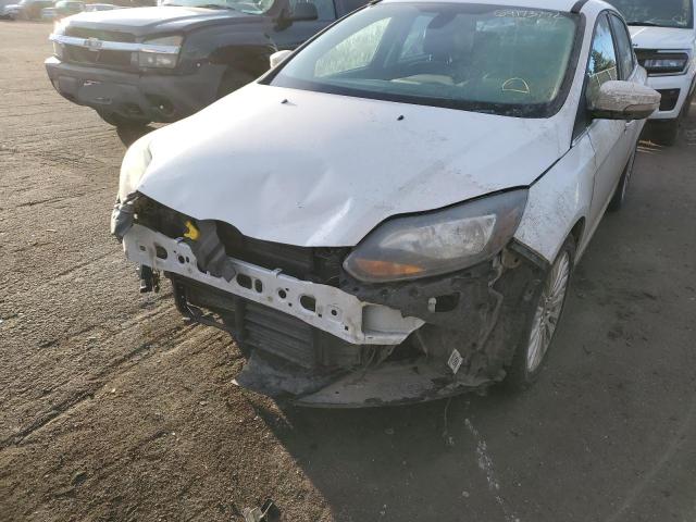 Photo 9 from auction – 2012 FORD FOCUS TITA with VIN 1FAHP3J26CL221305