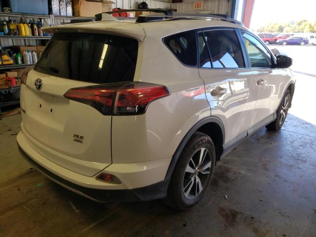 Photo 4 from auction – 2017 TOYOTA RAV4 XLE with VIN JTMRFREV4HJ704013