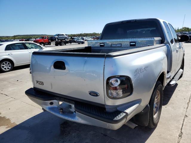 Photo 4 from auction – 2002 FORD F150 with VIN 1FTRX07W12KA04532