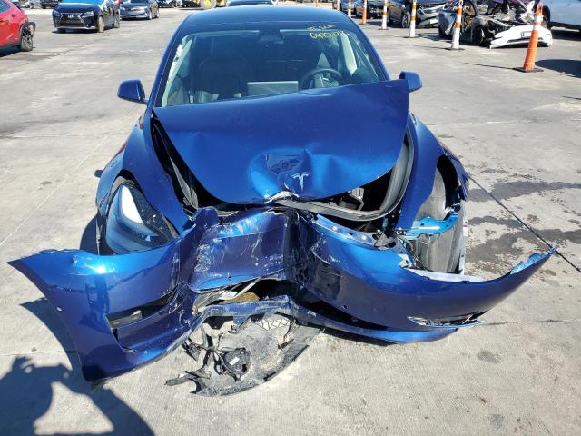 Photo 9 from auction – 2022 TESLA MODEL 3 with VIN 5YJ3E1EB8NF106364