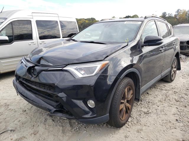 Photo 2 from auction – 2018 TOYOTA RAV4 ADVEN with VIN 2T3RFREV8JW721422