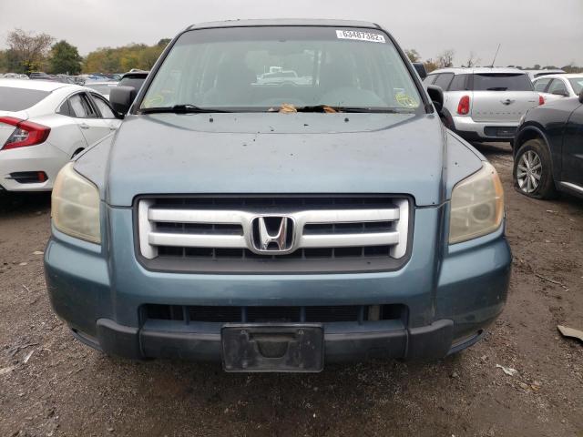 Photo 9 from auction – 2006 HONDA PILOT LX with VIN 2HKYF181X6H542934