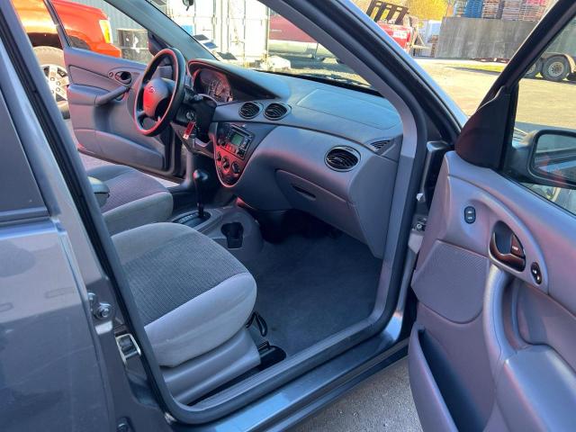 Photo 9 from auction – 2003 FORD FOCUS SE with VIN 1FAFP36383W332154