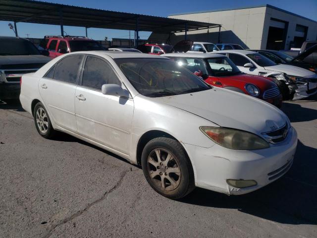 Photo 4 from auction – 2004 TOYOTA CAMRY LE with VIN JTDBE30K540251602