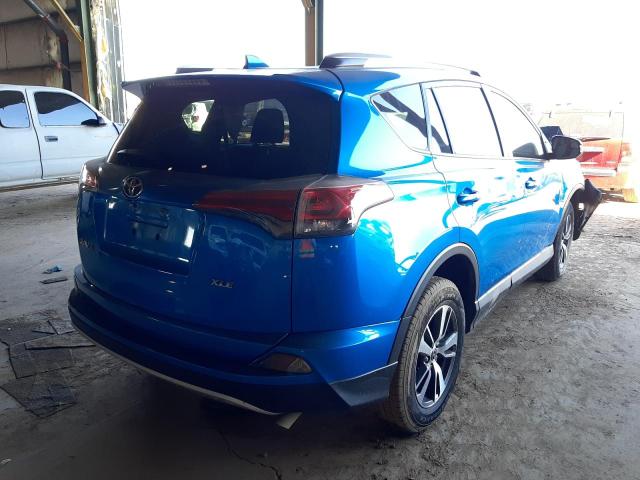 Photo 4 from auction – 2016 TOYOTA RAV4 XLE with VIN JTMWFREV4GD087681