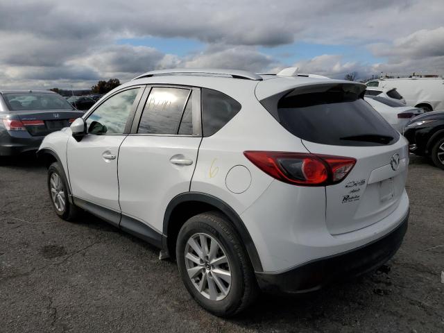 Photo 3 from auction – 2014 MAZDA CX-5 TOURI with VIN JM3KE4CY6E0303883