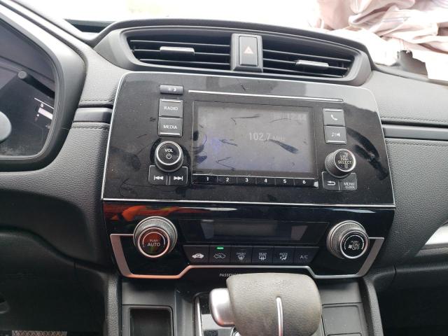 Photo 9 from auction – 2018 HONDA CR-V with VIN 5J6RW5H35JL002256