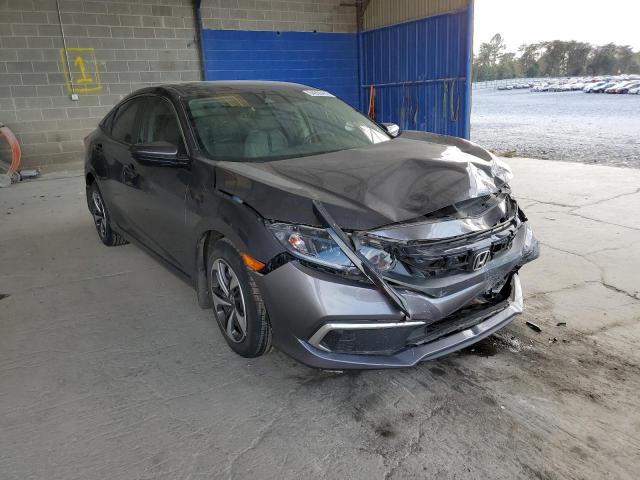 HONDA CIVIC LX 2019 with VIN 19XFC2F65KE028606 - Photo from auction