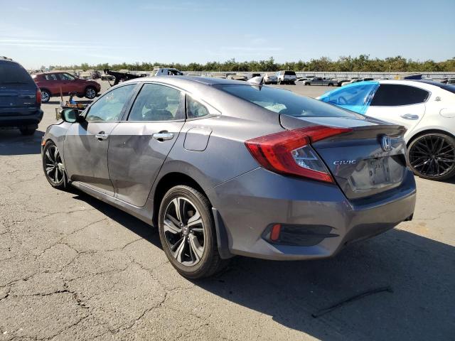 Photo 3 from auction – 2016 HONDA CIVIC TOUR with VIN 19XFC1F97GE211856