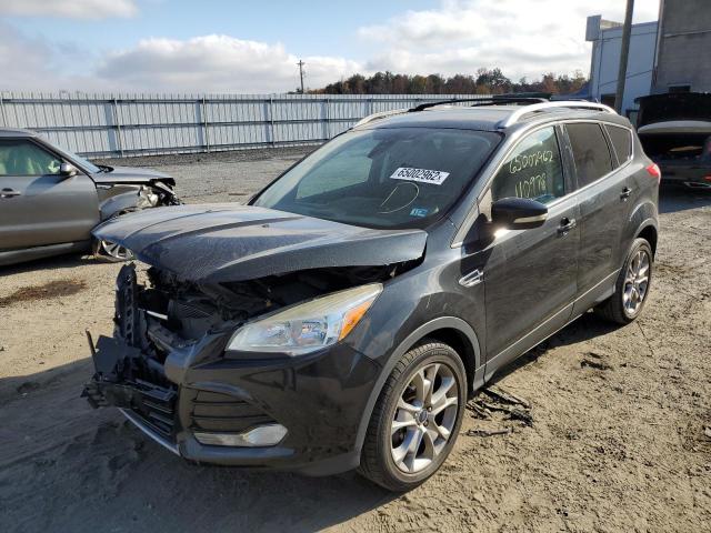 Photo 2 from auction – 2014 FORD ESCAPE TIT with VIN 1FMCU9J98EUB52946