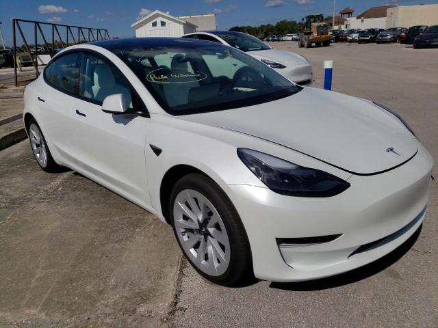 TESLA MODEL 3 2022 with VIN 5YJ3E1EB5NF253824 - Photo from auction