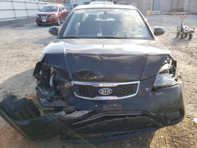 Photo 9 from auction – 2011 KIA RIO BASE with VIN KNADH4A30B6749131