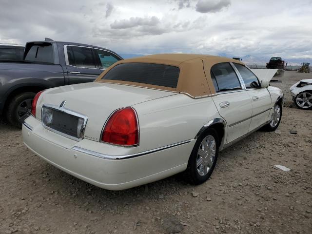 Photo 4 from auction – 2004 LINCOLN TOWN CAR U with VIN 1LNHM83W54Y645283