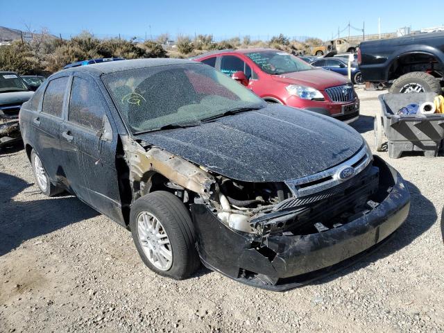 FORD FOCUS SE 2011 with VIN 1FAHP3FN9BW112059 - Photo from auction