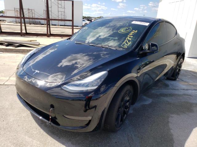 Photo 2 from auction – 2021 TESLA MODEL Y with VIN 5YJYGDEE9MF172920