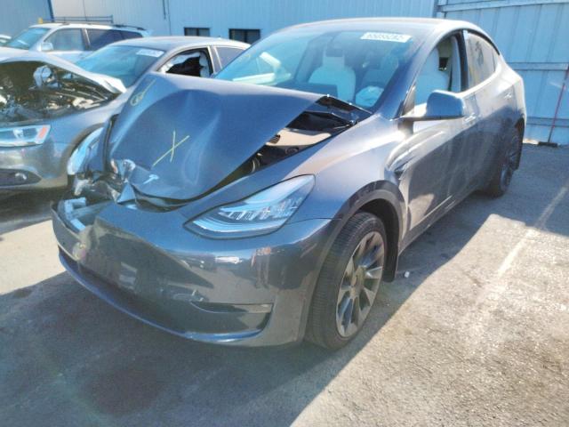 Photo 2 from auction – 2021 TESLA MODEL Y with VIN 5YJYGDEE0MF281167