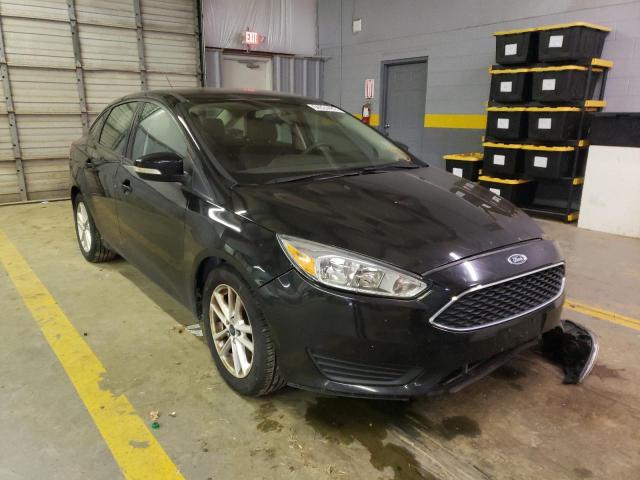 FORD FOCUS SE 2015 with VIN 1FADP3F28FL374778 - Photo from auction
