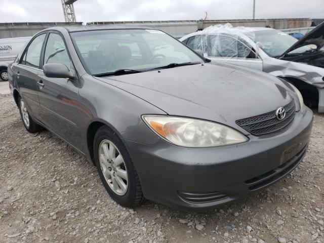 TOYOTA CAMRY LE 2002 with VIN 4T1BF30K52U509017 - Photo from auction