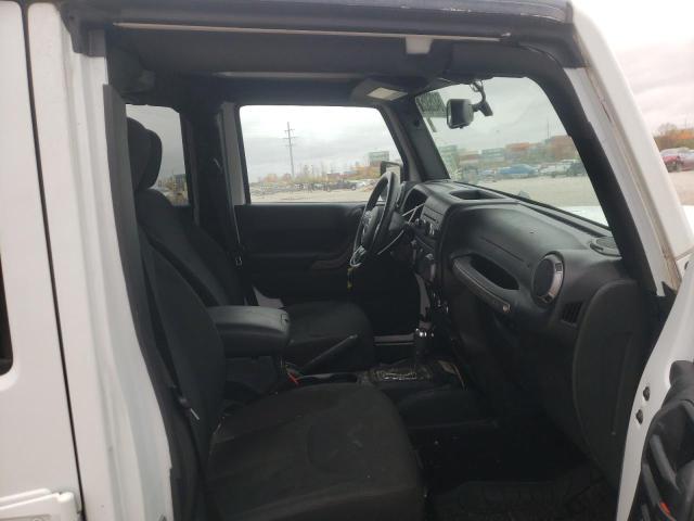 Photo 5 from auction – 2015 JEEP WRANGLER U with VIN 1C4BJWDG3FL606206