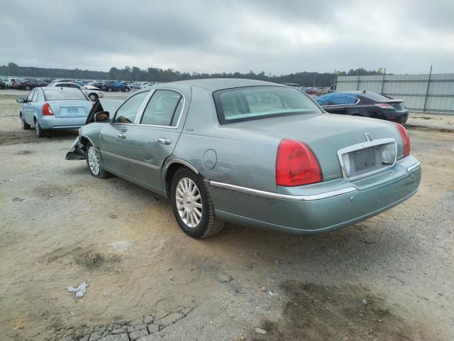 Photo 3 from auction – 2004 LINCOLN TOWN CAR E with VIN 1LNHM81W04Y632623