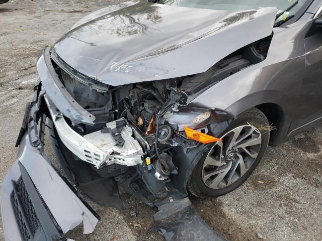 Photo 9 from auction – 2018 HONDA CIVIC EX with VIN 2HGFC2F76JH540226