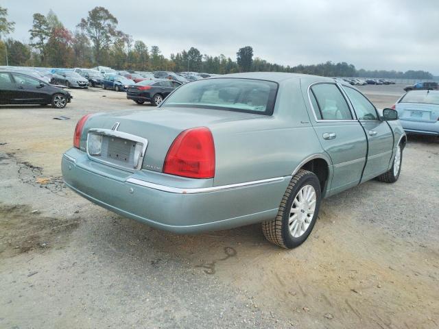 Photo 4 from auction – 2004 LINCOLN TOWN CAR E with VIN 1LNHM81W04Y632623