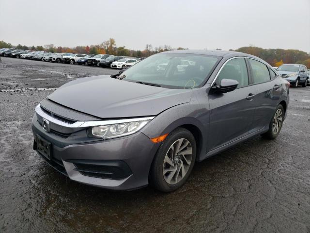 Photo 2 from auction – 2018 HONDA CIVIC EX with VIN 19XFC2F76JE203002