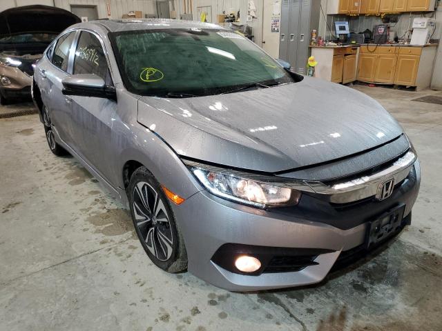 HONDA CIVIC EX 2016 with VIN 19XFC1F3XGE038121 - Photo from auction