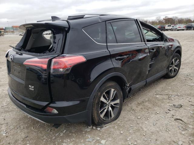 Photo 4 from auction – 2017 TOYOTA RAV4 XLE with VIN 2T3RFREV1HW695644
