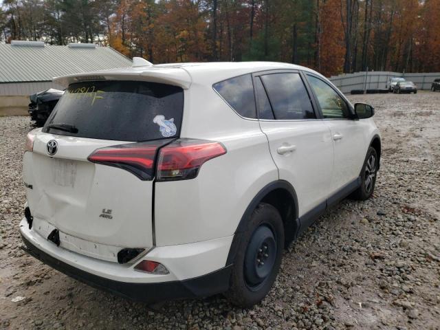Photo 4 from auction – 2017 TOYOTA RAV4 LE with VIN JTMBFREV5HJ716172